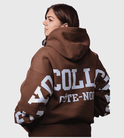 Women's oversized brown Côte-Nord hoodie with white collegiate lettering – back view