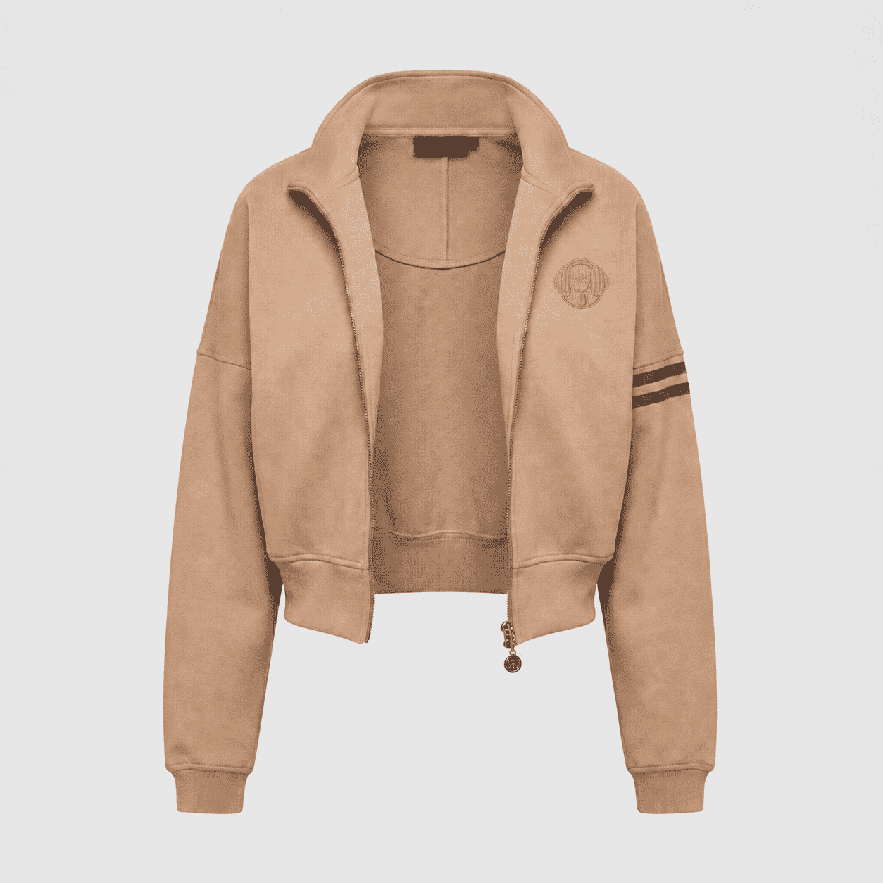 Close-up of sand beige cropped zip jacket with contrast stripe sleeve and embroidered logo