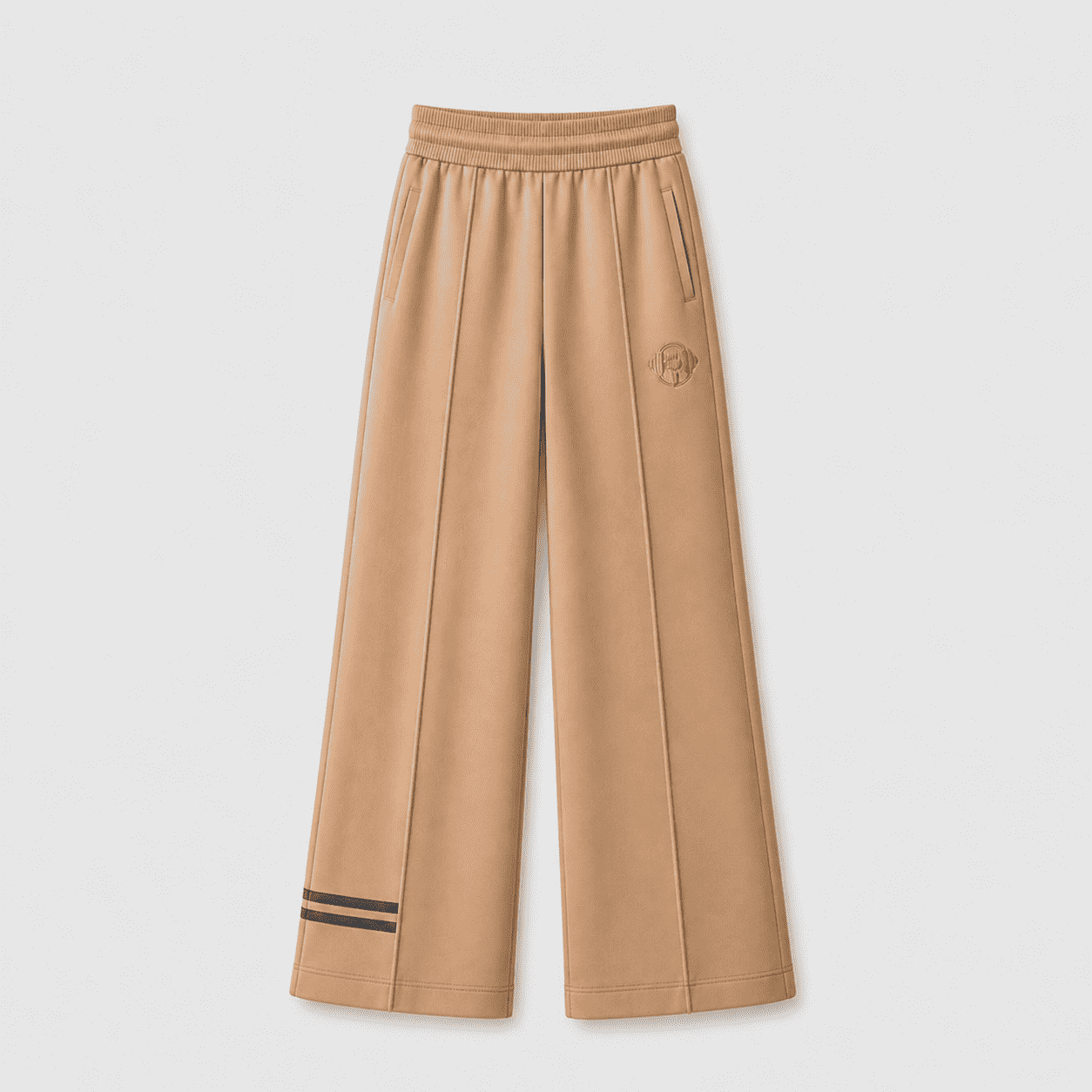 Sand beige wide-leg sweatpants with contrast stripe ankle detail and embroidered logo
