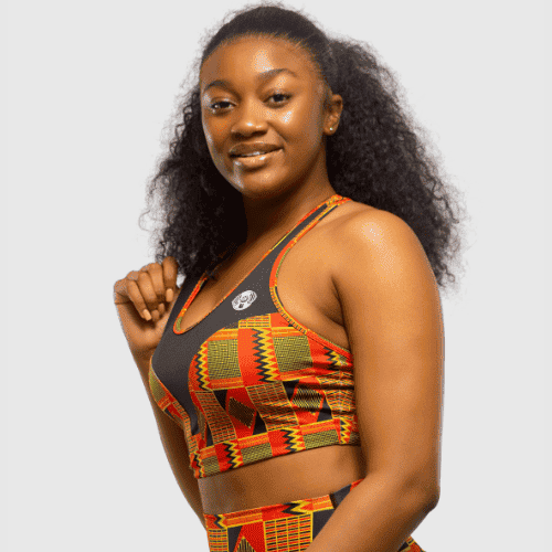 Side view of women's breathable racerback sports bra with Kente print detail
